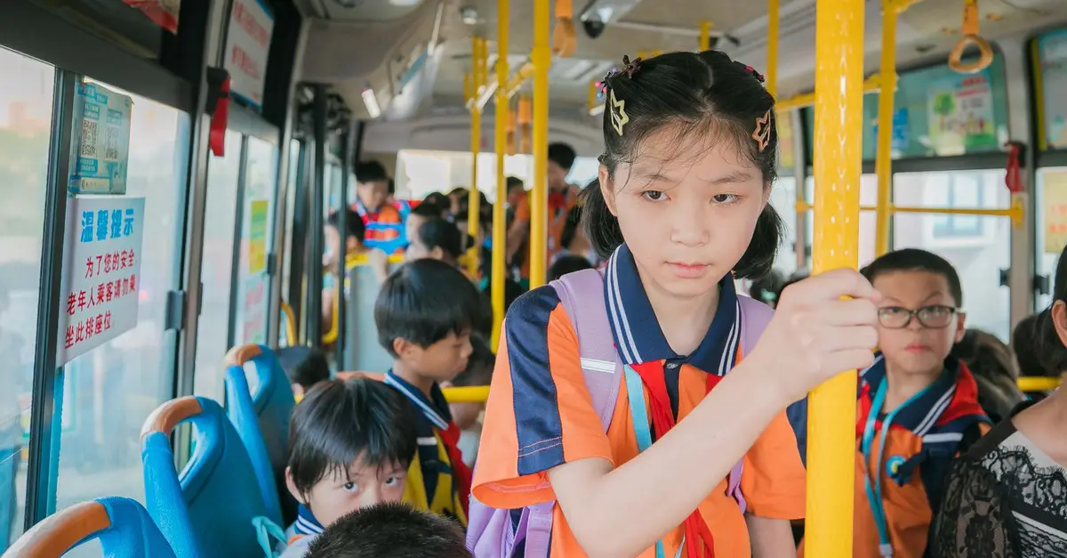 Students seated on a bus
