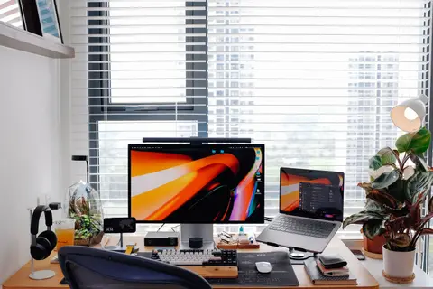 Business website design on desktop and laptop screens